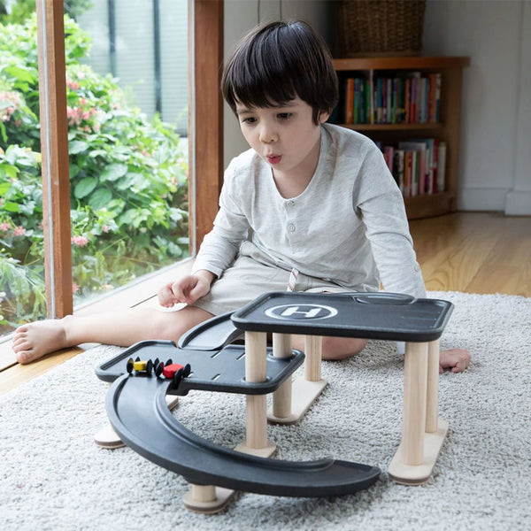 PlanToys Race 'n' Play Parking Garage – Customisable Wooden Toy Garage | Ages 3+ Wooden Toy PlanToys