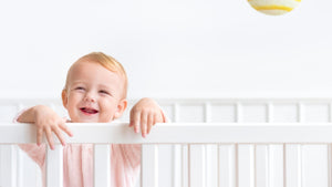 Happy Baby in White Cot - Little Gliders Baby Nursery Furniture