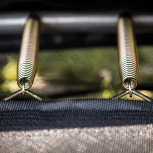 Detailed view of BERG trampoline SoloSpring springs for high bounce performance and safe jumping.