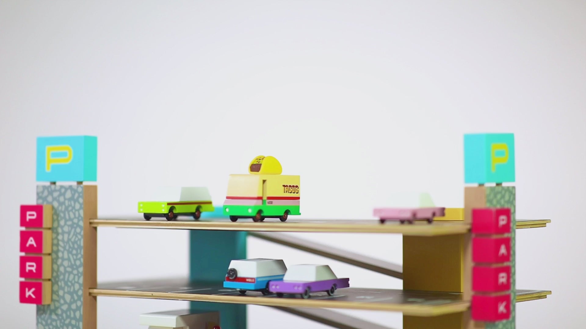 Showcase of Candylab Magnetic Parking Garage – stylish wooden parking structure with magnetic bays to neatly store CANDYCAR® wooden vehicles for creative play