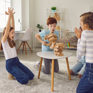 Group of children playing stacking game indoors – Little Gliders 6-10 year collection