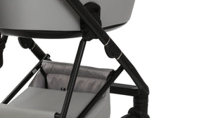 Close-up of the lower frame and storage basket of the Mee-go Milano Evo Pushchair.