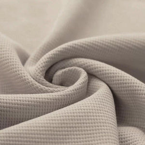 High-quality textured fabric for nursery bedding, soft and gentle on baby’s skin, ideal for baby essentials. Jupiduu Indoor Jumpspot at Little Gliders